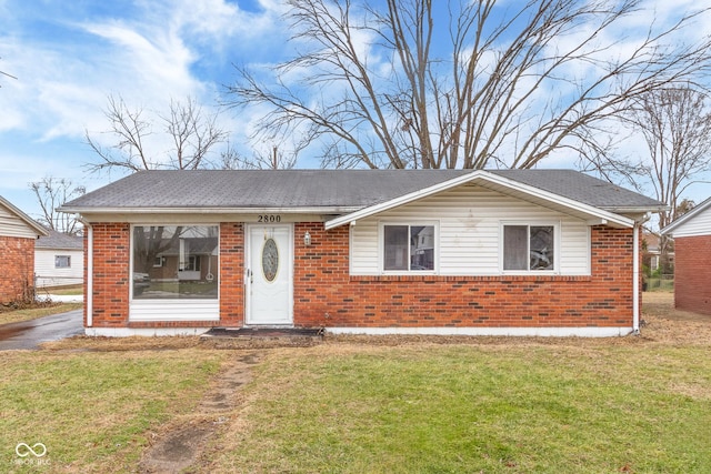 view of front of home with a front yard