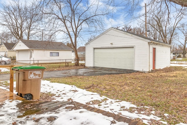 view of snow covered garage