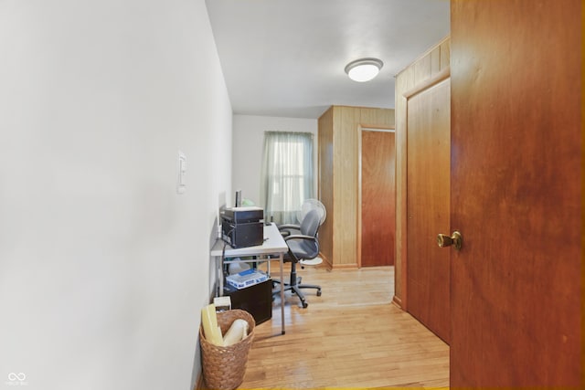 office area with light hardwood / wood-style floors