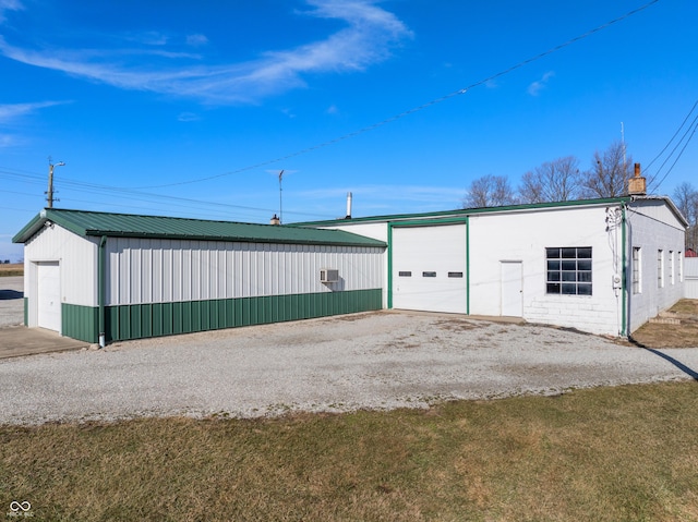 garage with a yard