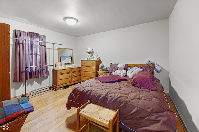 bedroom with light wood-type flooring