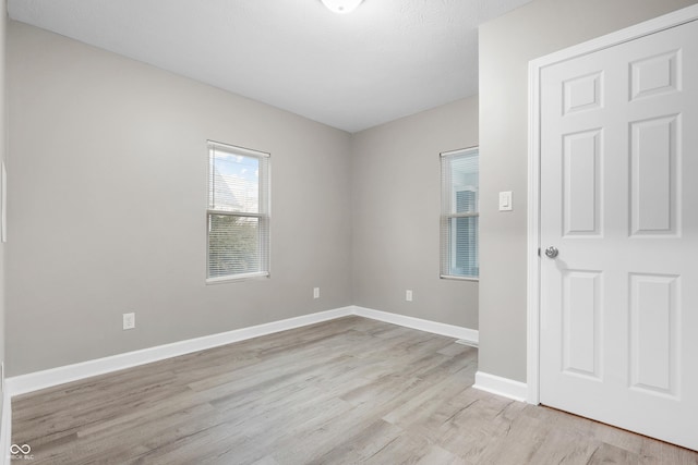 empty room featuring light hardwood / wood-style floors