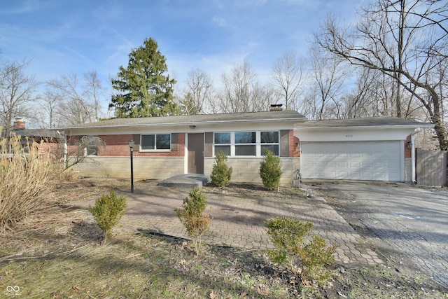 single story home featuring a garage