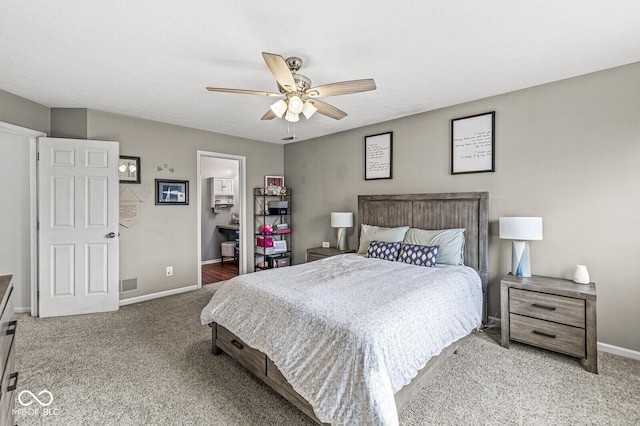 bedroom featuring ceiling fan and carpet