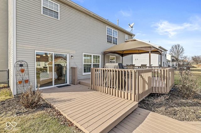 wooden deck featuring a gazebo