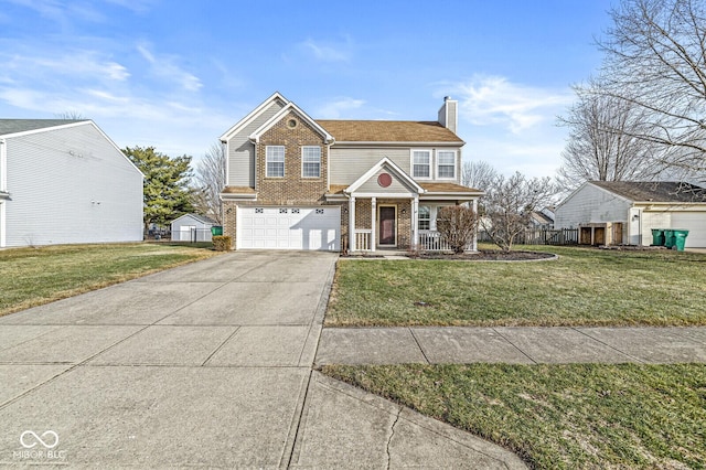 view of front of house with a garage and a front lawn