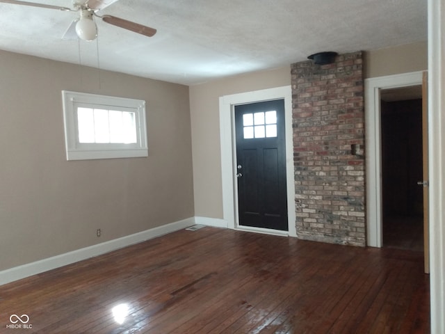 foyer featuring dark hardwood / wood-style floors and ceiling fan