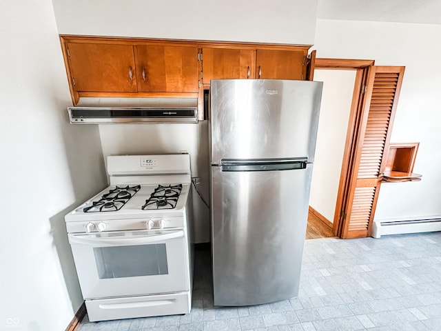 kitchen with exhaust hood, white gas stove, stainless steel fridge, and a baseboard radiator