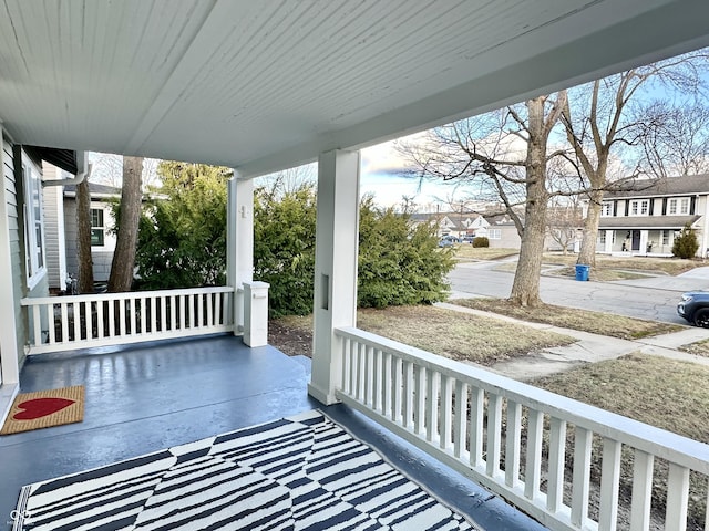 balcony featuring a porch