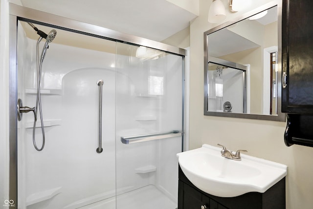 bathroom featuring vanity and walk in shower