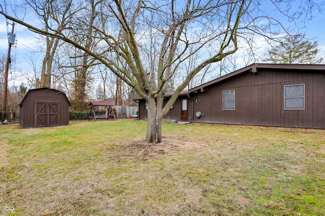 view of yard with a storage unit