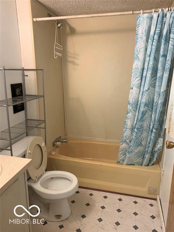 full bathroom featuring vanity, shower / tub combo, a textured ceiling, and toilet