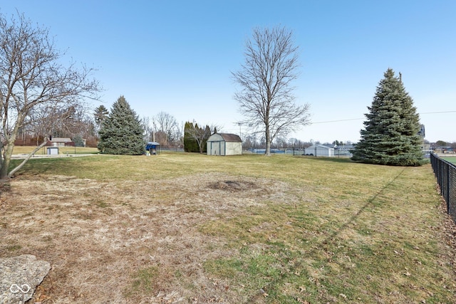 view of yard with a shed