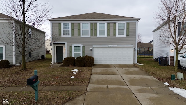 view of front of property with a garage