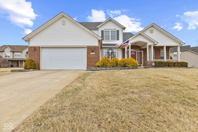 view of front of home with a garage, a front yard, and a porch