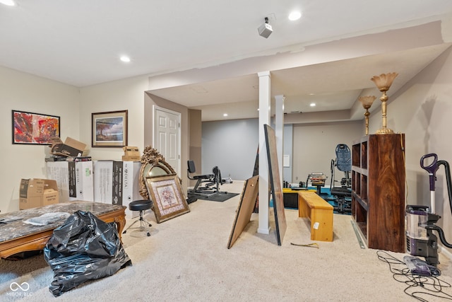 workout room featuring carpet flooring