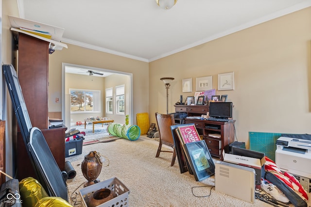 office space with ornamental molding, light carpet, and ceiling fan