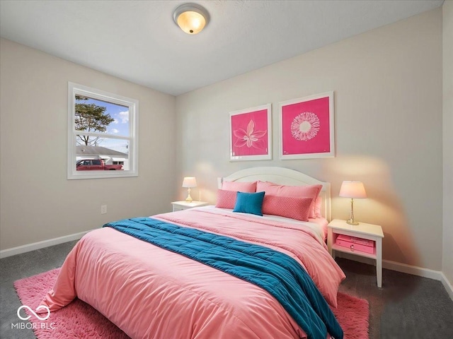 bedroom featuring dark carpet