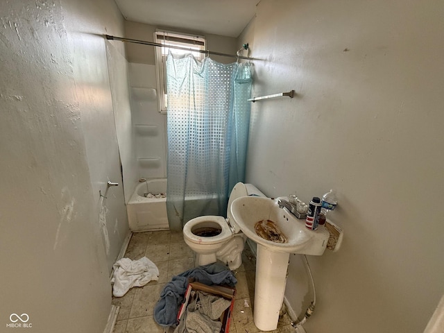 bathroom with toilet, tile patterned floors, and shower / bathtub combination with curtain