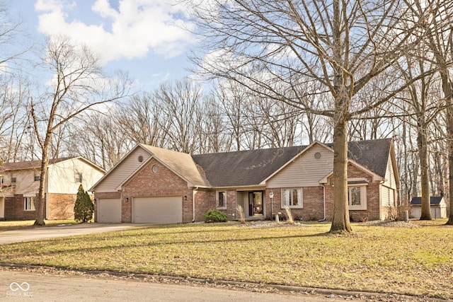 view of front facade with a garage and a front yard