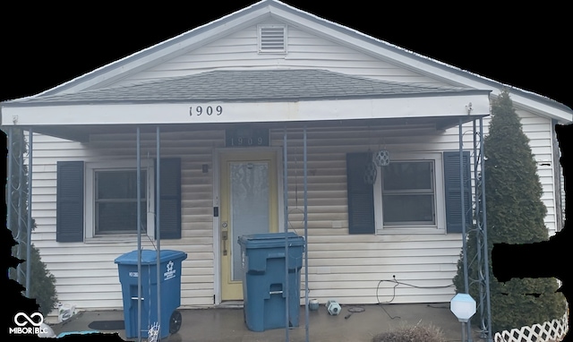 view of front of property featuring covered porch