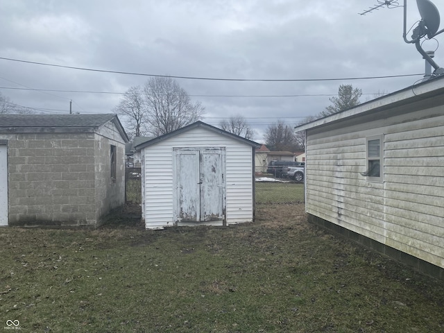 view of outdoor structure featuring a yard