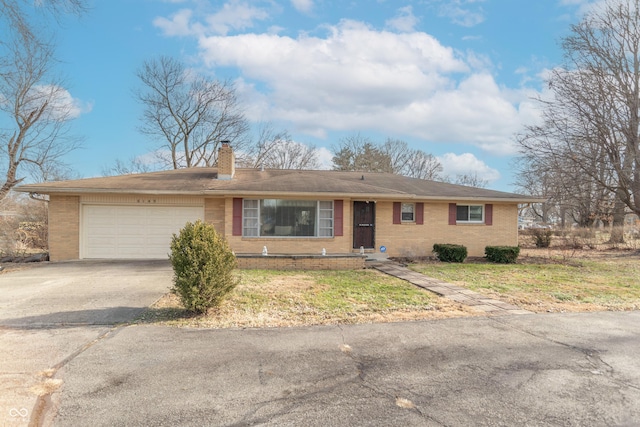 single story home with a garage