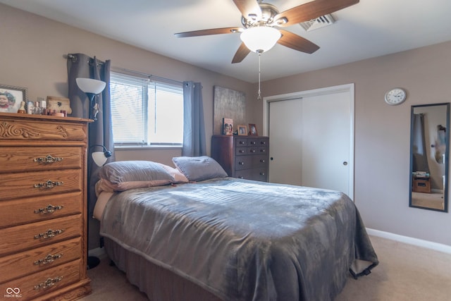 bedroom featuring ceiling fan, carpet floors, and a closet