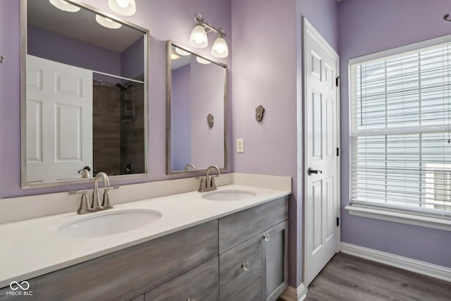 bathroom featuring vanity and wood-type flooring