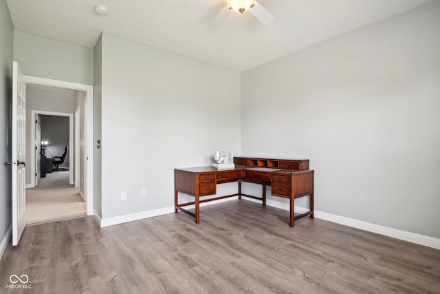 office area with ceiling fan and light hardwood / wood-style flooring