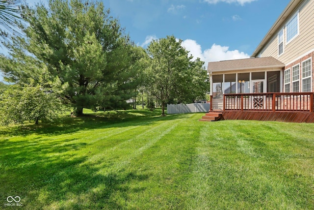 view of yard featuring a sunroom