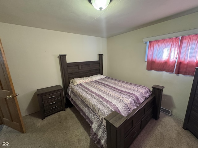 bedroom featuring carpet