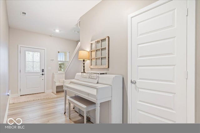 miscellaneous room with light hardwood / wood-style floors