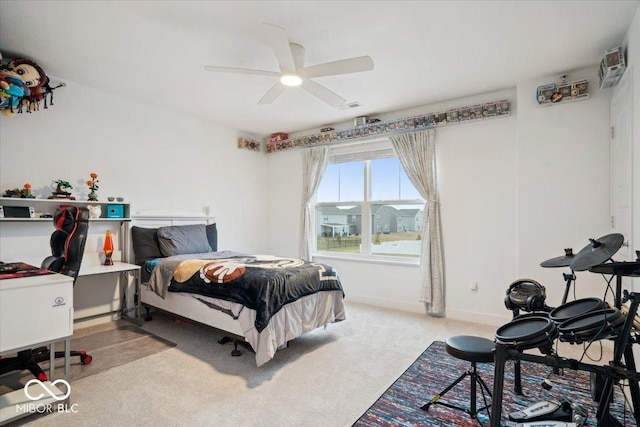 bedroom with light colored carpet and ceiling fan