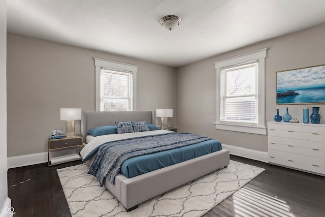 bedroom featuring dark hardwood / wood-style floors