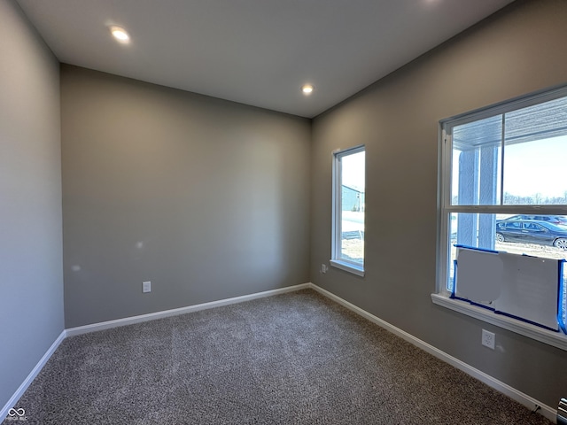 unfurnished room featuring recessed lighting, baseboards, and carpet floors