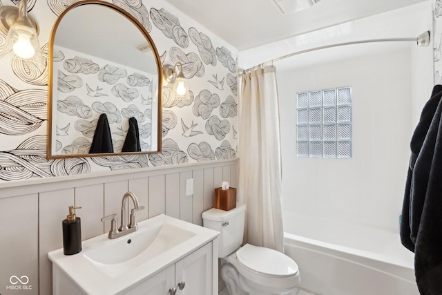 full bathroom with vanity, toilet, and shower / bath combo