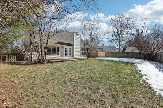 view of yard with french doors