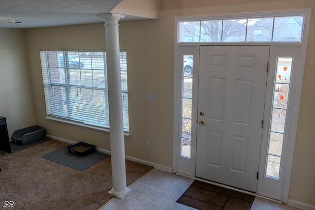 entryway with decorative columns