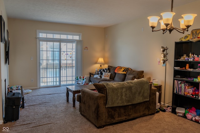 carpeted living room with a textured ceiling and a chandelier