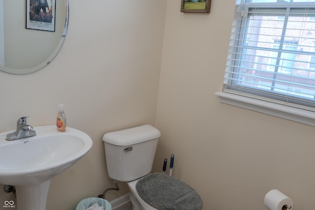 bathroom with sink and toilet