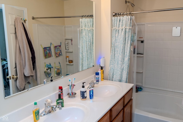 bathroom with vanity and shower / bath combo with shower curtain