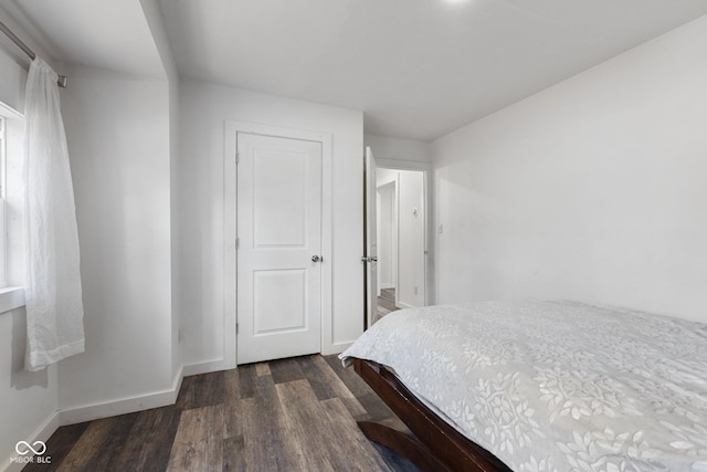 bedroom featuring dark hardwood / wood-style floors