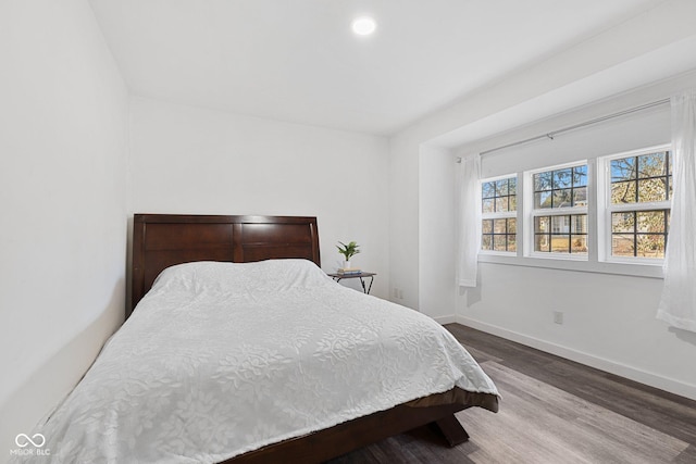 bedroom featuring hardwood / wood-style flooring