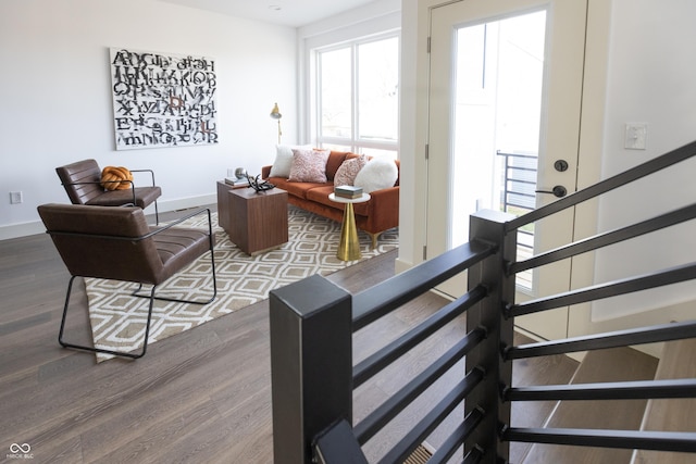 living room with dark hardwood / wood-style floors