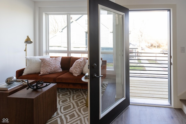 doorway with hardwood / wood-style floors