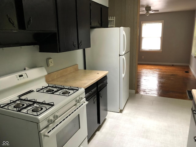 kitchen with ceiling fan, white appliances, and light wood-type flooring