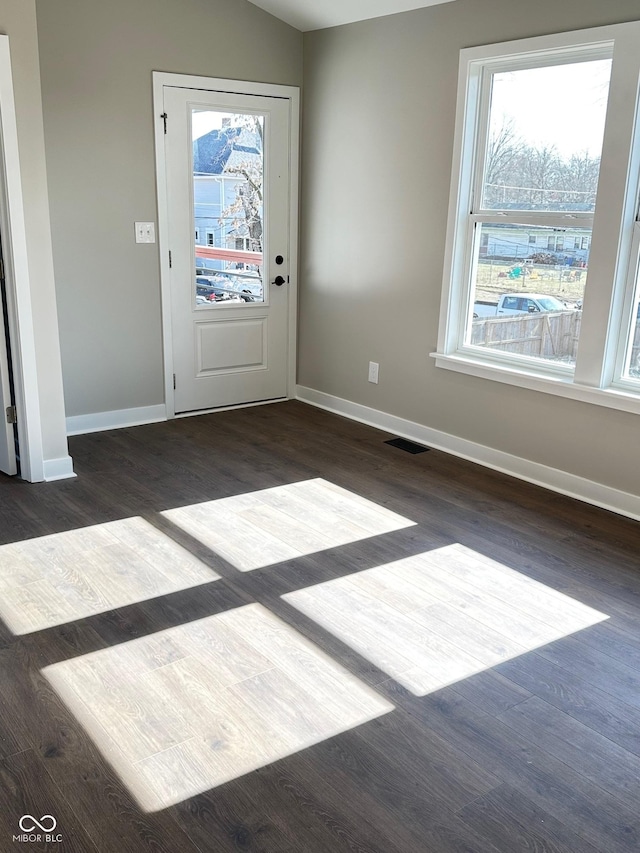 interior space with dark wood-type flooring