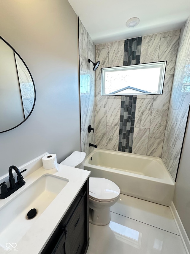 full bathroom with vanity, toilet, and tiled shower / bath combo