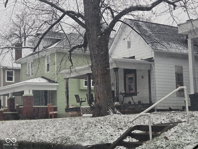 view of front of property with a chimney